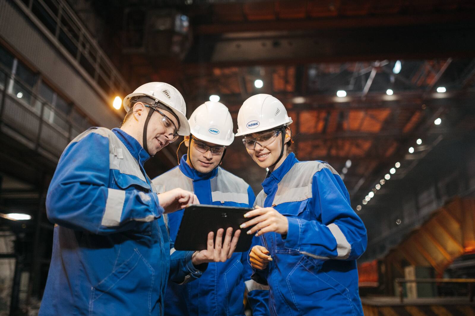 Technical team working on connected industrial and edge systems